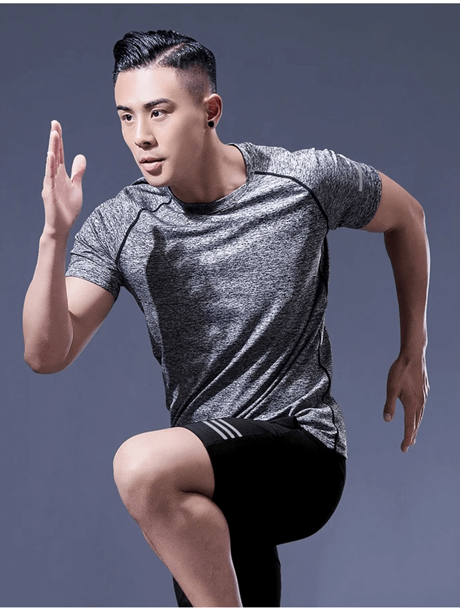 Man wearing breathable sportswear, sprinting; Men's Fitness Tee and Shorts Combo Set for peak performance; SF2027